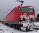 143 233-5 mit RE38591 von Warnemnde Richtung Berlin Hbf(tief)abgestellt im Bahnhof Warnemnde.05.12.10