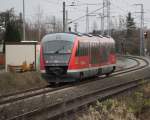 RE8 von Wismar nach Tessin bei der Ausfahrt im Rostocker Hbf.26.11.2011