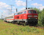 218 473 mit Sonderzug 56710(Neumünster-Binz)am Vormittag des 02.07.2022 in der Güterumfahrung beim Rostocker Hbf.