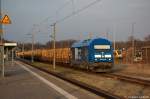 BR 223/187483/253-015-8-press-223-052-2-mit 253 015-8 PRESS (223 052-2) mit einem Holzzug in Rathenow in Richtung Stendal unterwegs. 28.03.2012