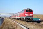 218 199-8 mit Nahverkehrszug in der Einfahrt nach Illertissen am 18.02.2008.