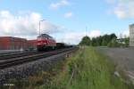 233 217-9 beim Anfahren mit dem morgentlichen 45367 NN - Cheb beim warten auf die berholung durch 612er mit RE und Vogtlandbahnin Wiesau.