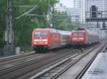 Whrend 101 057-8 auf der Stadtbahn unterwegs war,wartete 114 015-1 am Einfahrsignal von Berlin Zoologischer Garten,am 05.Mai 2012,auf Einfahrt.