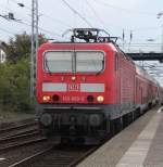 143 860-5 mit S1 von Rostock Hbf nach Warnemnde bei der Einfahrt im Bahnhof Rostock-Bramow.14.10.2012