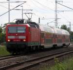 143 589-0 mit RE 92156 von Neustrelitz Hbf nach Rostock Hbf bei der Einfahrt im Rostocker Hbf.24.05.2013