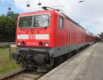 143 306-9 stand am 30.05.2015 mit dem legendren Warnemnde-Express 18591 von Warnemnde nach Berlin Hbf(tief)im Bahnhof Warnemnde.