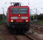 RE38590 von Berlin Hbf(tief)Richtung Warnemnde bei der Einfahrt um 11.01 Uhr im Bahnhof Warnemnde(25.09.10)