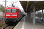 112 106 die am 06.10.2010 ihr Hauptuntersuchung bekommen hat steht mit dem RE2 (RE 38167) nach Knigs Wusterhausen in Rathenow.