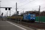 145 023-6 PRESS (145 083-2) mit leeren Holzug in Rathenow in Richtung Wustermark unterwegs. 17.01.2012