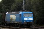 145 023-6  mit Holzzug von Rostock-Bramow nach Stendal-Niedergrne am 09.08.2014 kurz vor der Ausfahrt im Bahnhof Rostock-Bramow