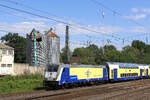 146 513 f�hrt in den Tostedter Bahnhof ein. Im Hintergrund zu sehen, die Abrissarbeiten der Siloanlagen. Datum: 16.07.2026