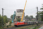152 167-3 f�hrt an den in Abriss befindlichen Getreidesilo in Tostedt vorbei. Datum: 17.08.2026.