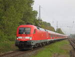 182 004 mit Kf 13292 von Warnemünde nach Berlin-Zoologischer Garten bei der Durchfahrt am 18.05. 2019 in Rostock-Bramow.