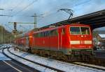 Die 111 147-5 schiebt am 28.01.2013 den RE 9  - rsx Rhein-Sieg-Express (Siegen - Kln - Aachen) vom Bahnhof Betzdorf/Sieg nun weiter in Richtung Kln.