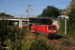 112 116-9 fhrt mit dem RE1 RE18171 nach Frankfurt/Oder bei Frankfurt/Oder Nuhnen vorbei.