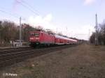 112 165-6 auf den Rckweg mit RE1 Brandenburg HBF bei Berlin-Friedrichshagen.