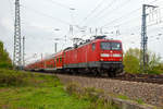   Die 112 155-7 (91 80 6112 155-7 D-DB) der DB Regio mit dem RE 1 Magdeburg Hbf nach Berlin Ostbahnhof, hier am 06.05.2017 in Magdeburg kurz vor der Elbe.