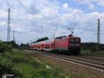 114 030-0 schiebt bei Briesen(Mark) den RE38026 Magdeburg HBF.