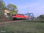 143 809-1 schiebt RE 18206 Frankfurt/Oder durch Eisenhttenstadt.