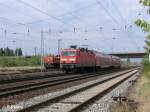 143 210-3 zieht ein RB11 Cottbus durch Eisenhttenstadt.