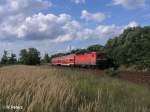 143 210-3 schiebt kurz hinter Eisenhttenstadt dne RB11 Frankfurt7Oder.