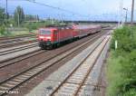 143 254-1 durchfhrt Eisenhttenstadt mit einer RB Cottbus.