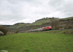 152 044-4 mit einem Autotransportzug bei Himmelstadt gen Süden.