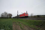 185 366-2 zieht ein gemischten Güterzug in Richtung Norden bei Himmelstadt.