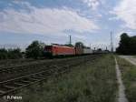 189 009-4 erreicht Saarmund mit ein Containerzug.