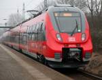 442 842-1 als S2 von Warnemnde nach Gstrow kurz vor der Ausfahrt im Bahnhof Rostock-Bramow.05.03.2014