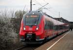 442 350-5 als S2 von Gstrow nach Warnemnde kurz bei der Ausfahrt im Haltepunkt Rostock-Holbeinplatz.21.03.2014