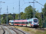 442 354 auf der S1 nach Warnemünde,am 15.Juli 2018,bei der Ausfahrt aus Rostock Hbf.