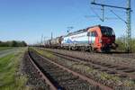 SBB Cargo International 193 475 zieht am 23 April 2026 bei Diepholz ein Kesselwagenzug.
