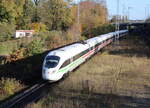 411 001-1 als ICE 1671 von Ostseebad Binz nach Karlsruhe Hbf bei der Durchfahrt in Rostock-Kassebohn.05.11.2022