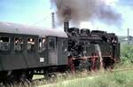 75 1118 gibt Schubhilfe für einen langen Personenzug von Amstetten nach Gerstetten am 16.06.1996.