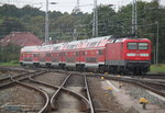 112 118 mit RE 18490(Berlin-Warnemünde)bei der Ausfahrt im Rostocker Hbf.03.09.2016
