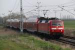 120 203-5 Als Sonderzug von Rostock Hbf nach Blankenberg(Meckl)kurz hinter Rostock Hbf,laut Bahn.de fuhr der Zug als RE 93106.22.04.2012