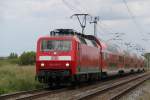120 205-0 mit RE 4308 von Rostock Hbf nach Hamburg Hbf bei der Durchfahrt am 10.06.2012 in Sildemow.