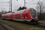 445 004-8+Twindexxwagen DBpza 782.1+445 010-5 als S1 von Warnemünde nach Rostock Hbf bei der Ausfahrt in Warnemünde.08.12.2017