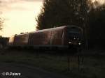 612 056-2 verlsst Wiesau/Oderpfalz als RE Regensburg bei untergehender Sonne.