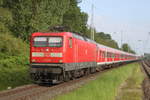 112 190 mit RE 13290(Warnemünde-Berlin)bei der Durchfahrt am 12.05.2018 in Rostock-Bramow.
