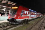445 007+Twindexxwagen DBpza 782.1+445 009 als RE 4360 von Elsterwerda nach Rostock Hbf kurz nach der Ankunft im Rostocker Hbf.21.12.2017  