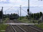 6614 zieht ein Containerzug durch die Kurve in Jacobsdorf(Mark) nach Frankfurt/Oder.