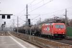185 631-9 (HGK 2066) mit Kesselzug in Rathenow in Richtung Wustermark unterwegs. 18.03.2011