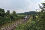 185 672-3 zieht bei Dettenhofen ein Containerzug richtung Nürnberg.