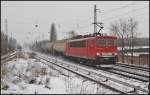 DB Schenker 155 055-7 mit einem Kesselwagenzug am 21.02.2013 H�he Berlin-Karow