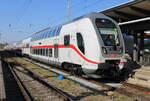 ic-doppelstock-steuerwagen/862316/ic-2265binz-schwerinkurz-vor-der-ausfahrt-im IC 2265(Binz-Schwerin)kurz vor der Ausfahrt im Rostocker Hbf.20.09.2024