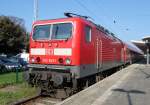 143 843-1 stand mit Warnemnde-Express 18591 von Warnemnde nach Berlin Hbf(tief)in Warnemnde abgestellt.04.10.2014