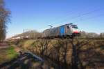 Mischer mit Lineas 186 452 durchfahrt Tilburg Oude Warande am 8 M�rz 2022.