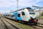 4746 303(Stralsund)als RE9 von Rostock Hbf nach Sassnitz kurz vor der Ausfahrt im Rostocker Hbf.23.08.2024